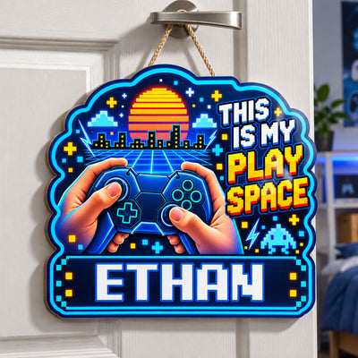Personalized wooden sign gamer controller in blue hanging from a door handle by a rope, name Ethan
