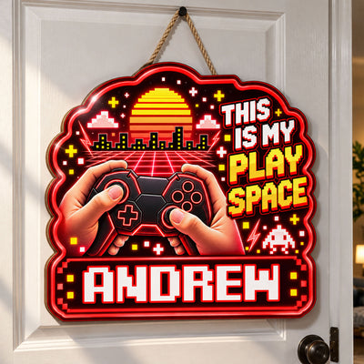 Personalized wooden sign gamer controller in blue hanging from a door handle by a rope, name Ethan