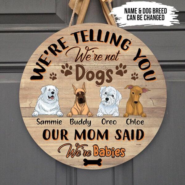 We&#39;re Telling You We&#39;re Not Dogs, Our Mom Said We&#39;re Babies - Personalized Wooden Doorsign