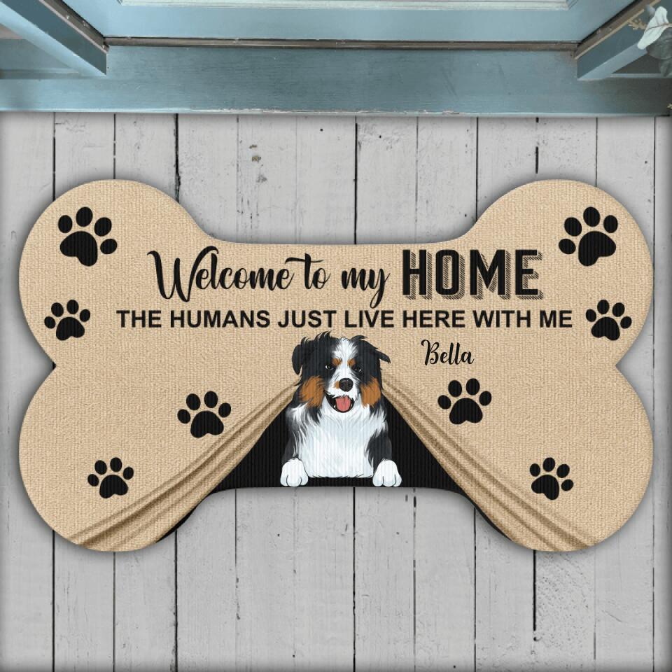 Welcome To Our Home The Humans Just Live Here With Us Doormat - Personalized Bone Shaped Doormat