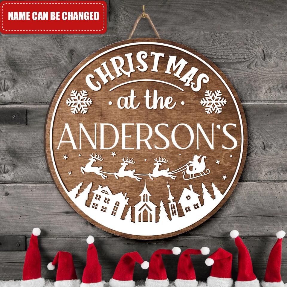 Christmas At The Family - Personalized Wooden Door Sign, Christmas Gift For Family