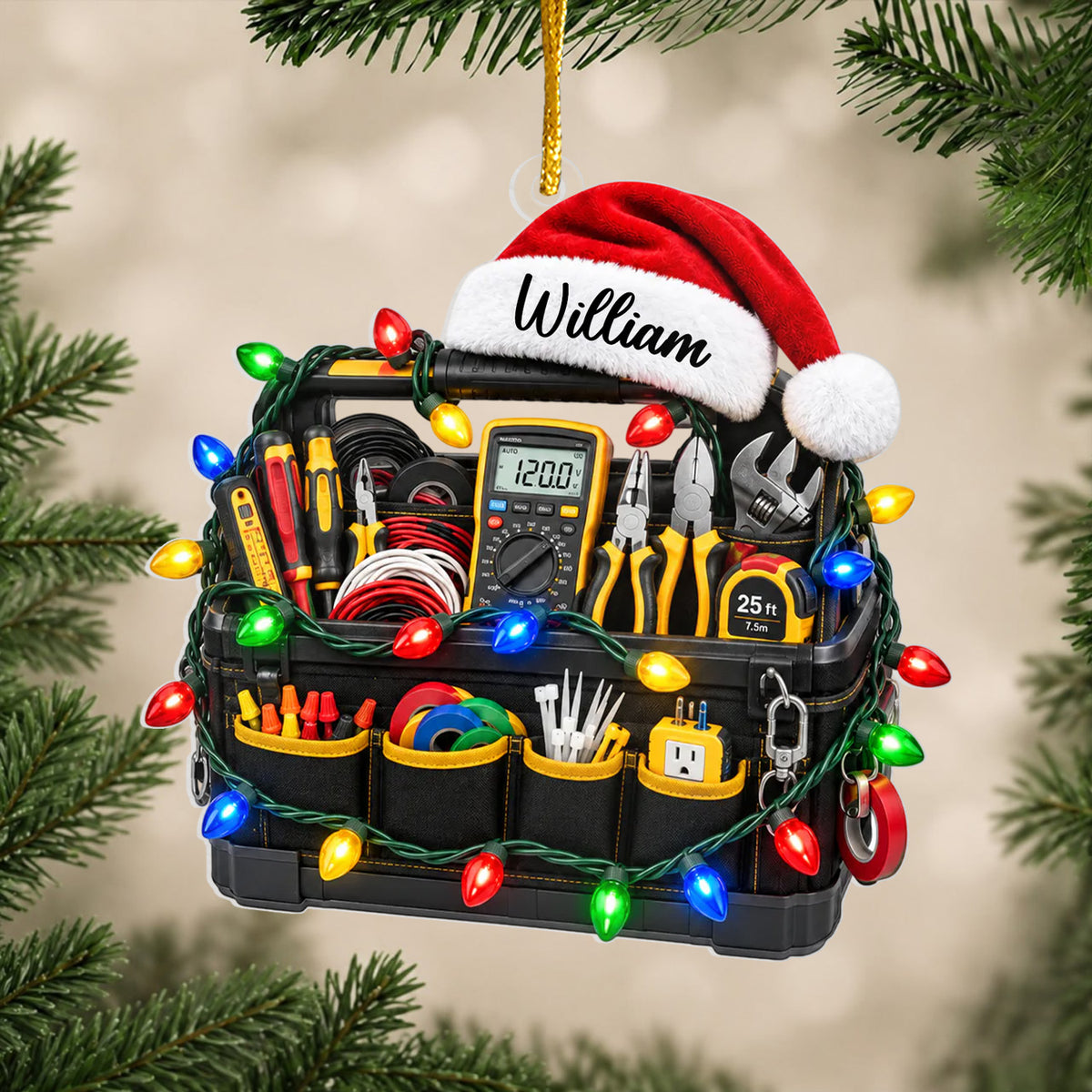Personalized electrician tool bag acrylic ornament with Santa hat and name, shown among green pine branches
