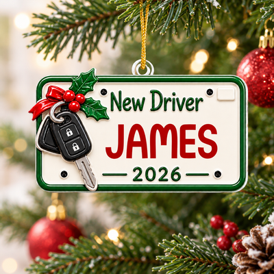Personalized New Driver Acrylic Ornament with name James hanging on a tree beside red baubles and lights