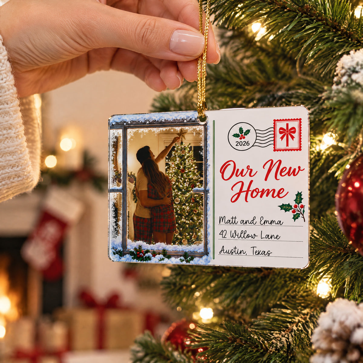 Personaliozed Rectangular Acrylic Ornament held by hand near a tree, fireplace and stocking in the background