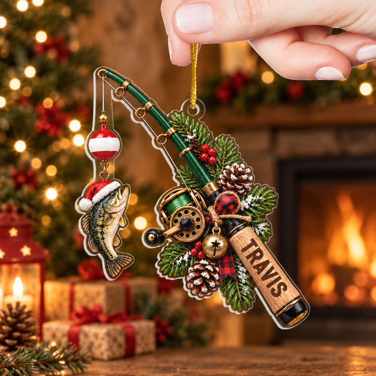 Personalized Acrylic Fishing Ornament held up in front of a fireplace, tree and wrapped gifts