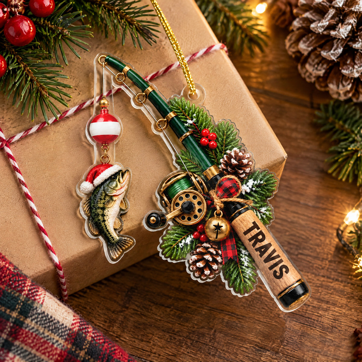 Personalized Acrylic Fishing Ornament lying on a wrapped brown gift with twine, pinecones and plaid fabric