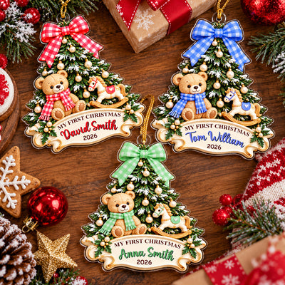 Personalized Teddy Bear Acrylic Ornament in red, blue and green versions on a wooden table with gifts and baubles