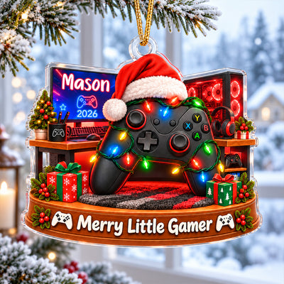 Personalized Acrylic Santa Hat Controller Ornament hanging by a snowy window with frosted branches outside