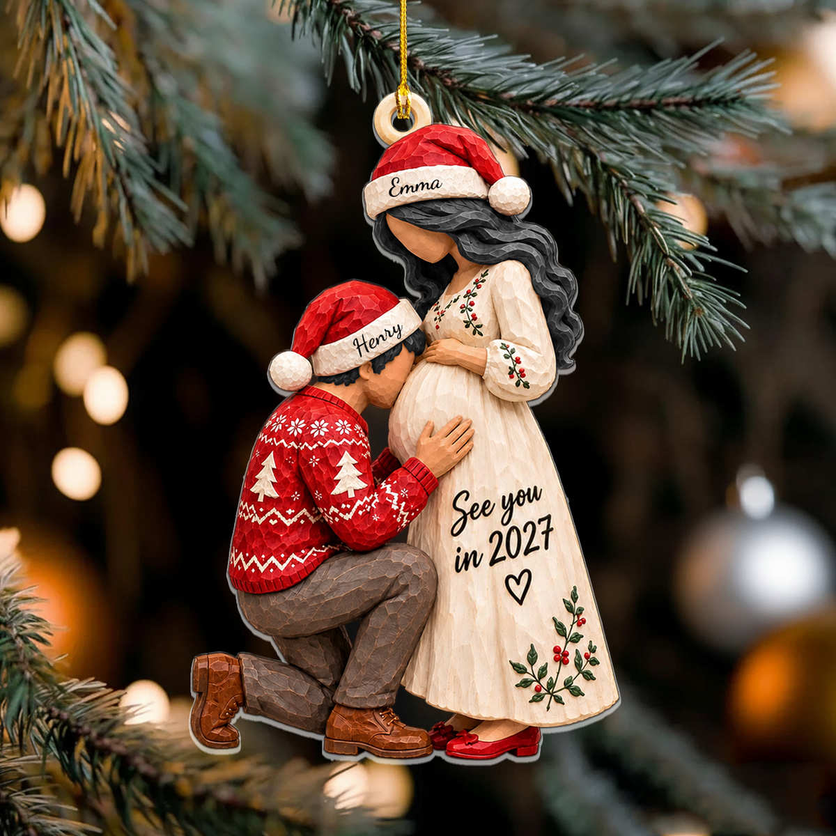 Personalized Acrylic Christmas Ornament with dark-haired couple in Santa hats, names Emma and Henry, in front of tree lights