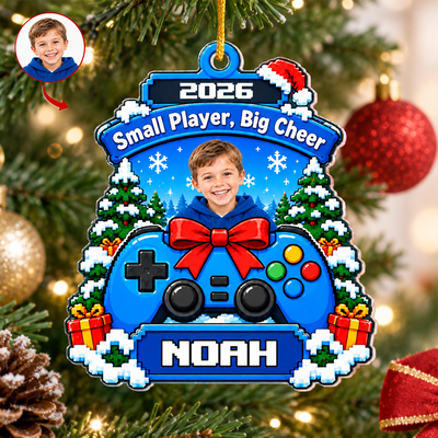 Personalized acrylic gamer ornament on a tree with a small round photo inset and red arrow in the corner