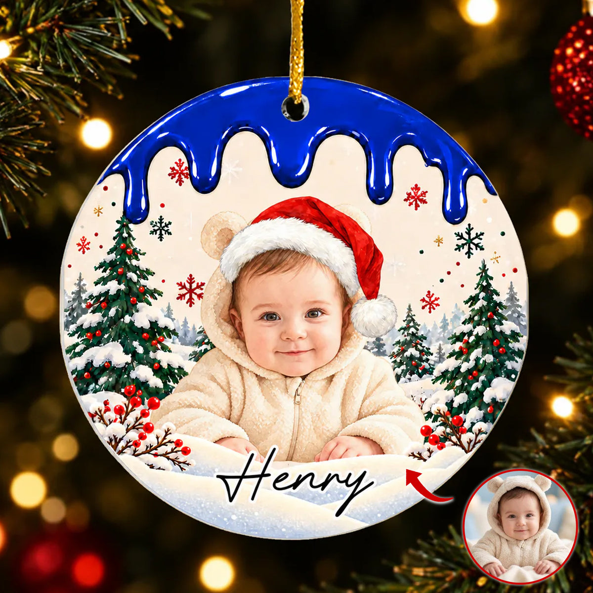 Personalized acrylic ornament custom photo with baby in Santa hat, blue drip top, hanging by a tree