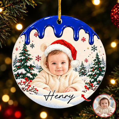 Personalized acrylic ornament custom photo with baby in Santa hat, blue drip top, hanging by a tree