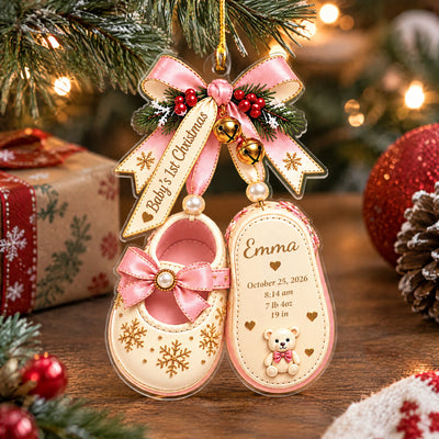 Personalized Baby Shoes Acrylic Ornament standing on a wooden table beside wrapped gifts and pinecone