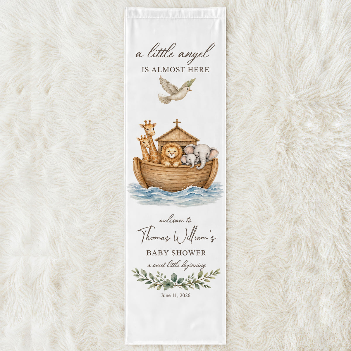 Personalized Baby Shower Backdrop laid flat on a fluffy cream rug, showing the ark animals and leaf wreath design