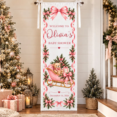 Personalized Pink Teddy Bear Sleigh Banner indoors by a decorated tree, lanterns, wrapped gifts and a staircase