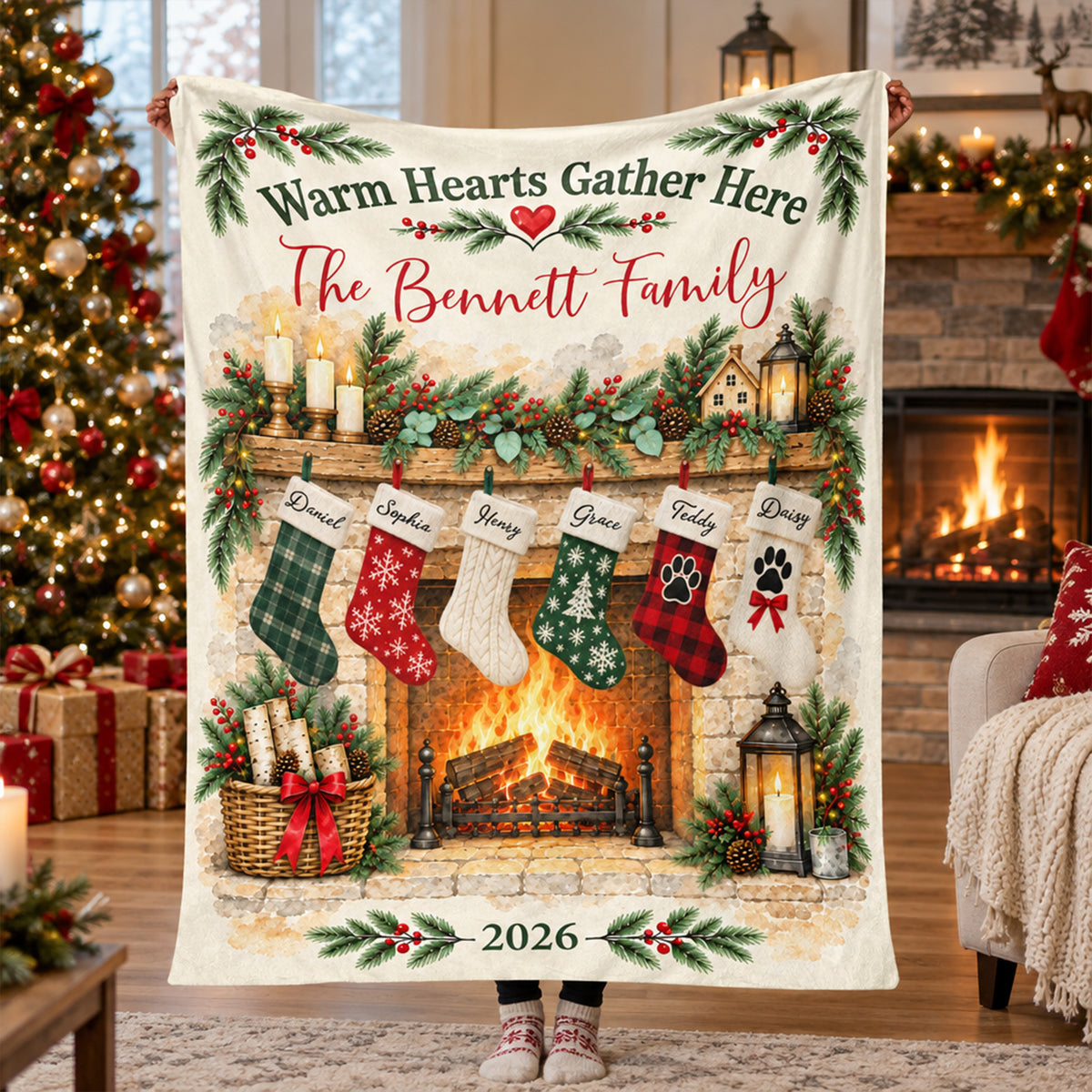 Personalized family name blanket held up by a person in front of a lit Christmas tree and fireplace
