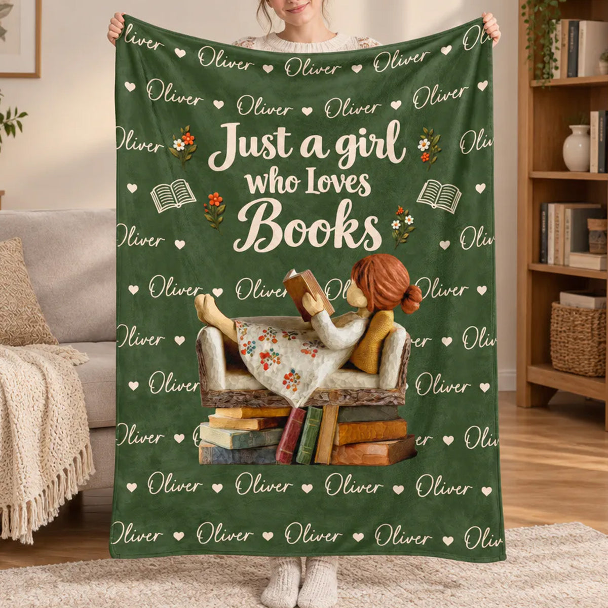 Personalized Custom Name Book Lover Blanket held up by a smiling person in a living room, green with girl reading