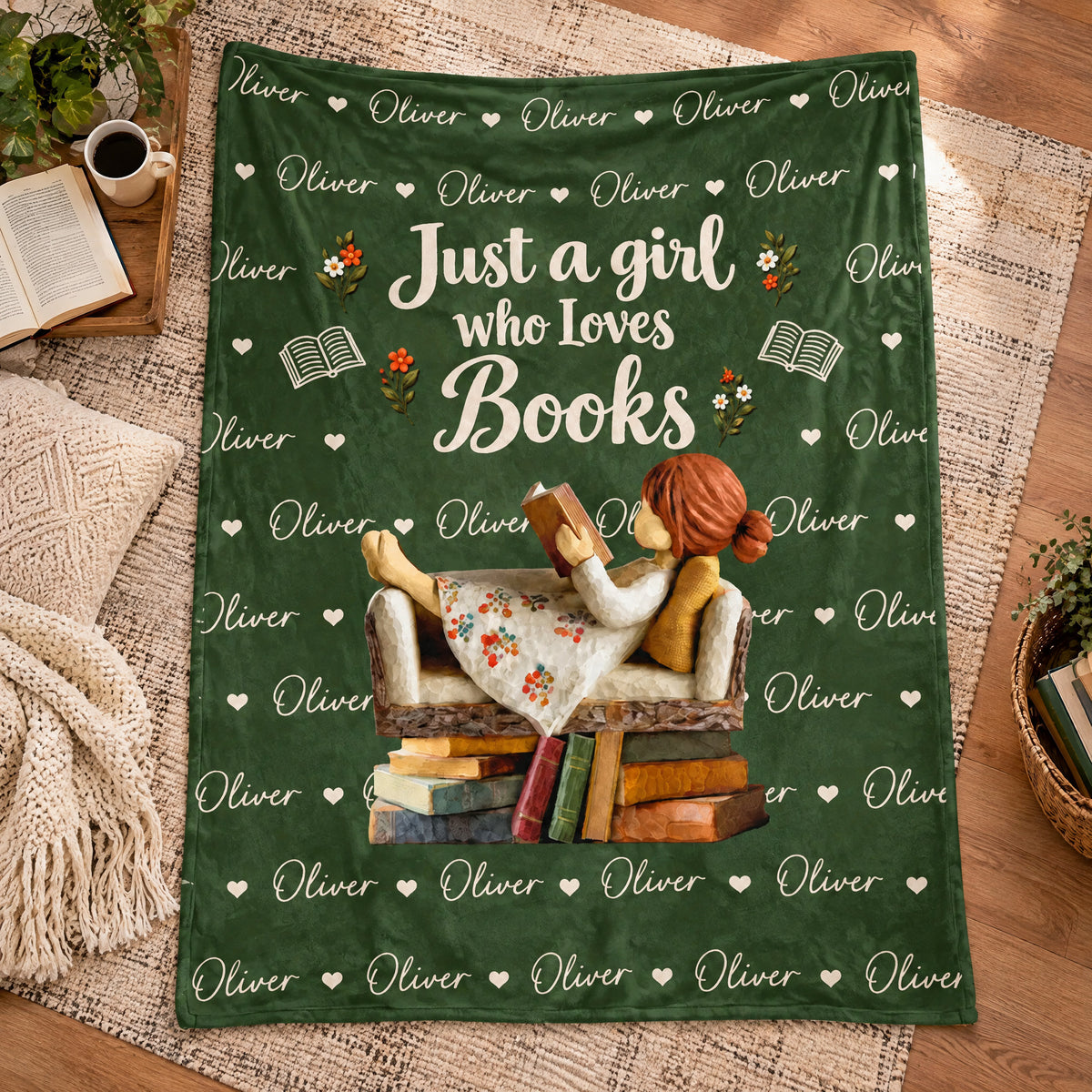Personalized Custom Name Book Lover Blanket laid flat on a woven rug with a coffee cup, open book and throw