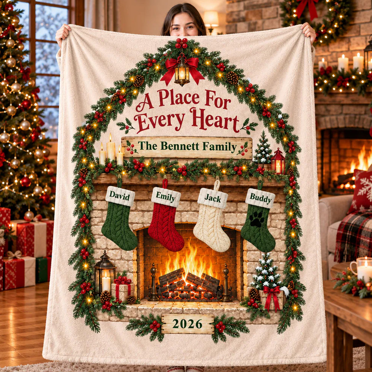 Personalized blanket custom family name in cream with four stockings, held up by a woman near a fireplace