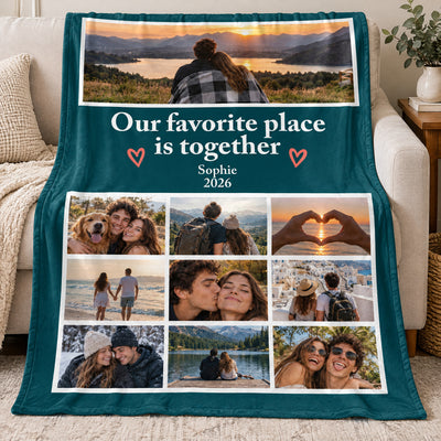 Personalized photo blanket draped over a sofa showing a teal design with nine photos and a heart caption