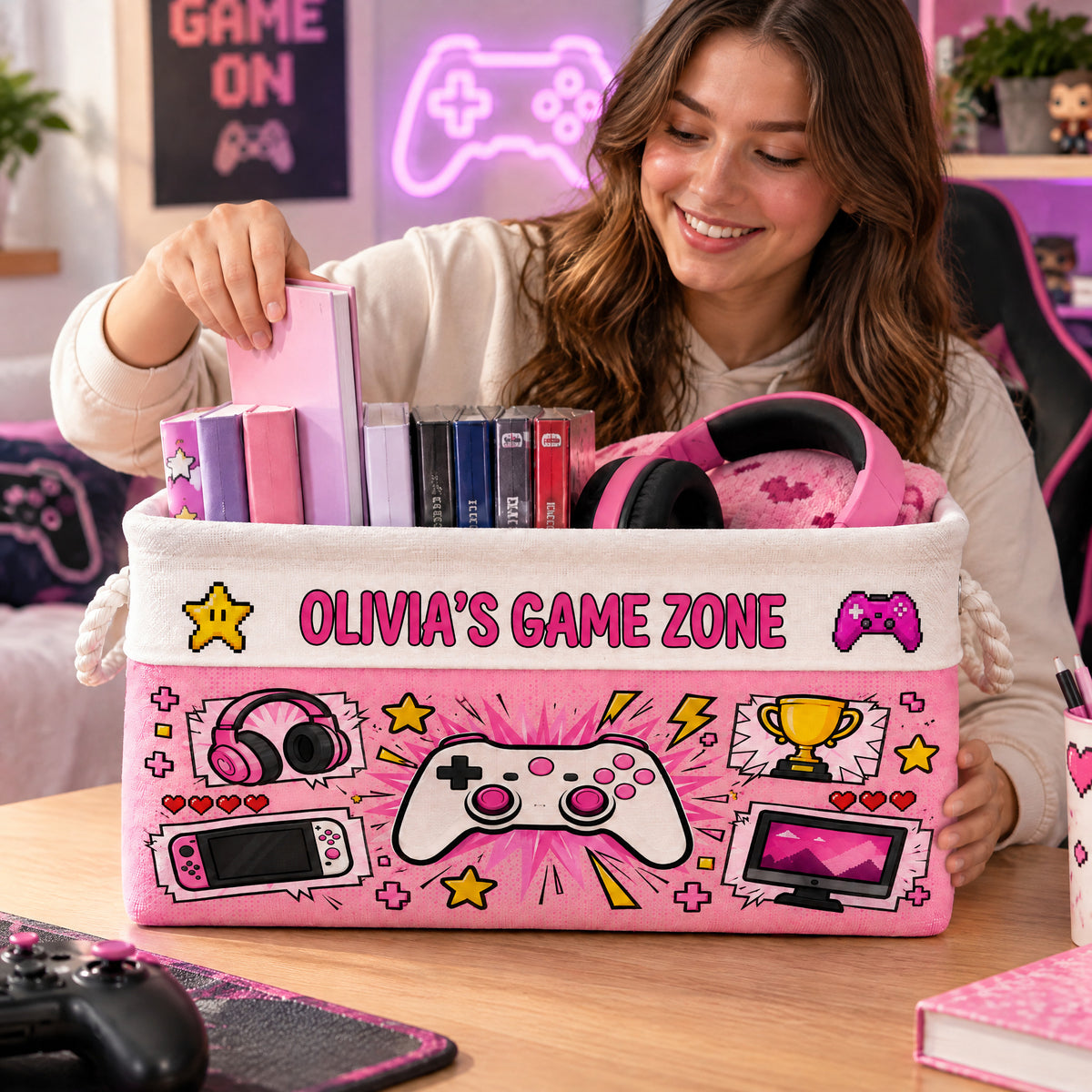 Personalized Game Zone Storage Basket held by a smiling woman at a desk, filled with books and pink headphones