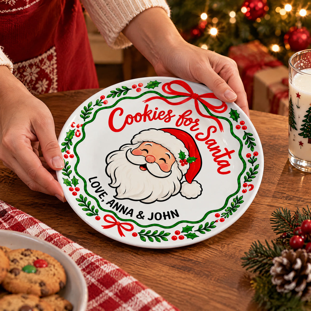 Personalized Cookies For Santa Ceramic Round Plate held by hands near a glass of milk and a bowl of cookies