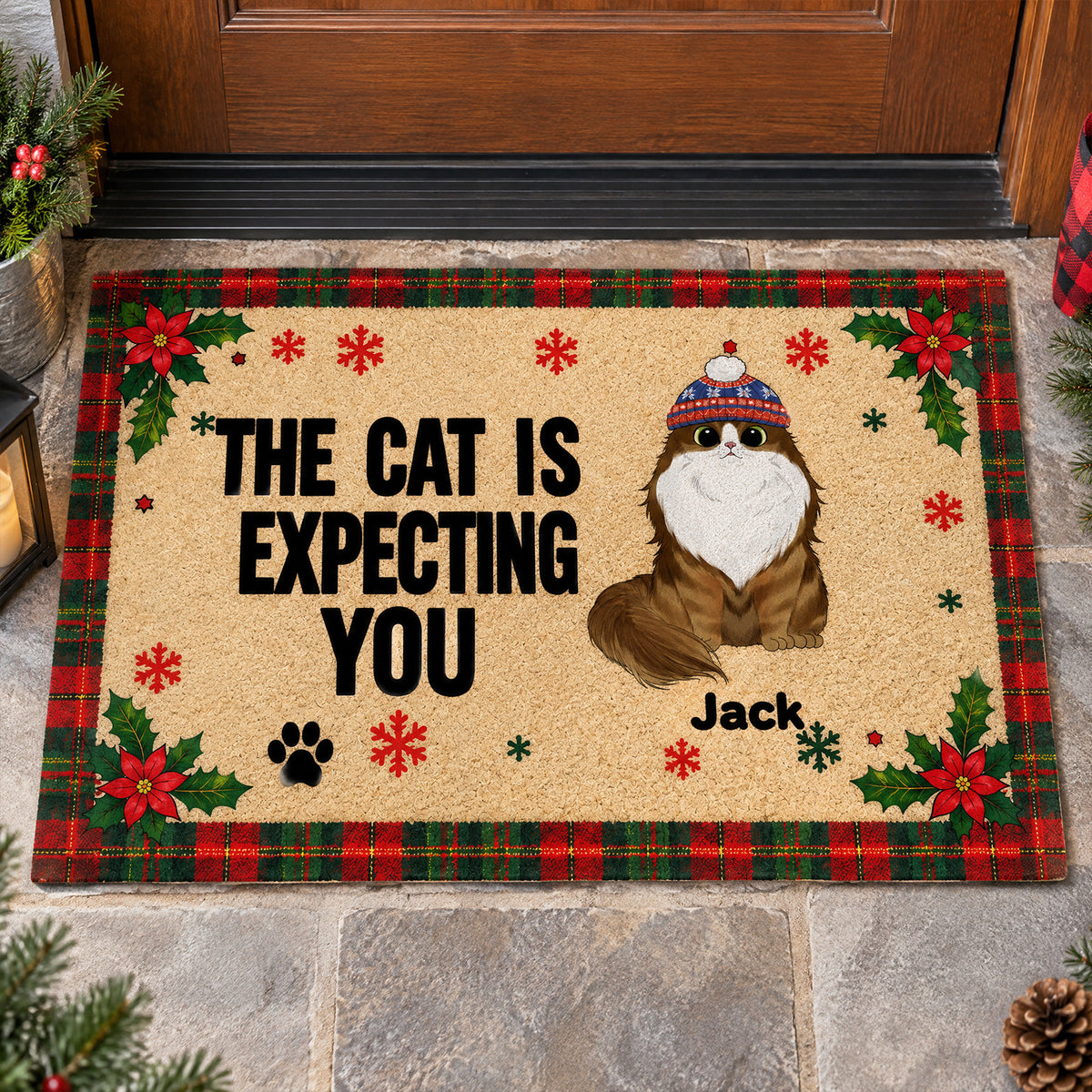 Personalized cat doormat showing one cat in a knit hat named Jack, on stone steps by a wooden door