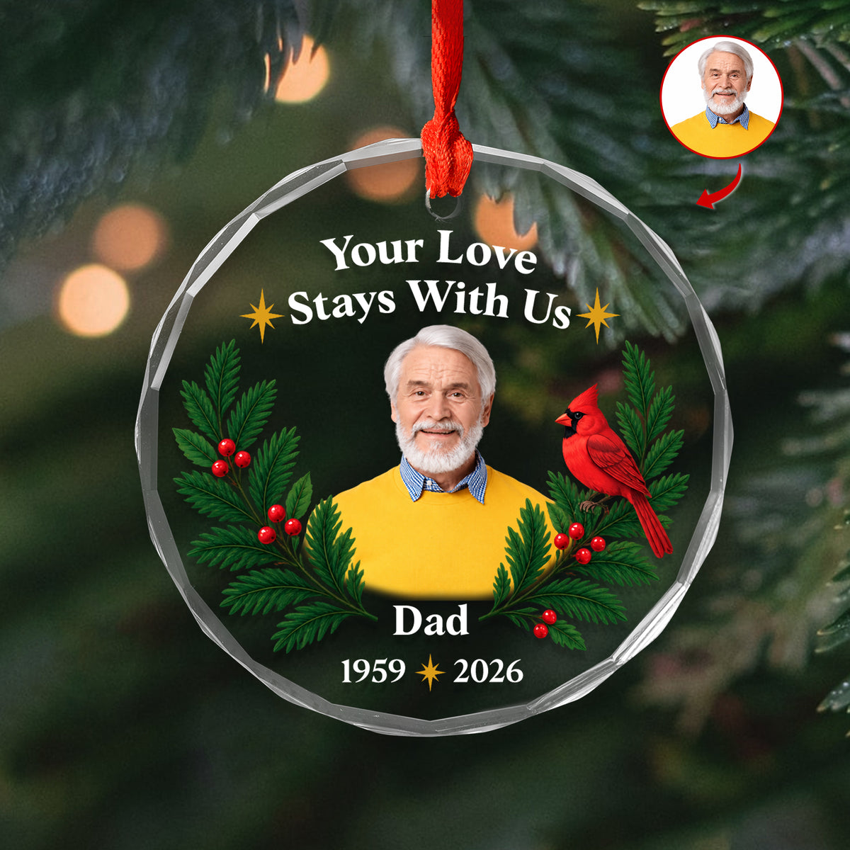 Personalized glass ornament custom photo showing a smiling man in a yellow sweater, with blurred warm lights behind