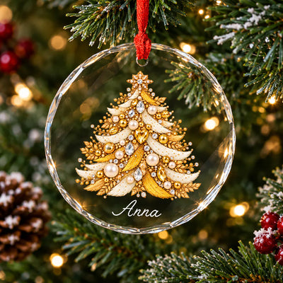 Personalized Christmas Tree Glass Ornament with gold jeweled tree hanging on a lit evergreen branch