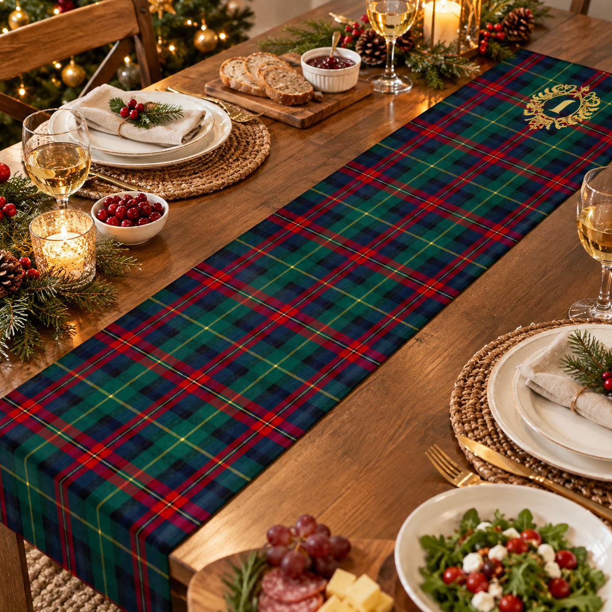 Personalized Christmas table runner on wooden table with candles, evergreen sprigs, red berries and place settings
