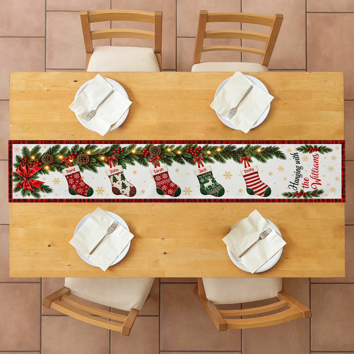 Custom family name stockings table runner on a wooden table with four place settings, seen from above