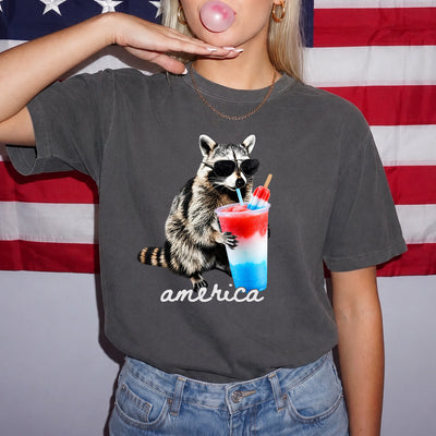 America Raccoon Drinking Patriotic Slushie T-shirt, Funny American Meme Tee, Red White Blue Popsicle Drink Shirt