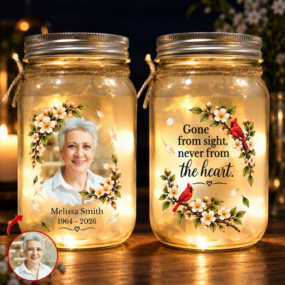 Personalized Mason Jar Light pair glowing, one with a woman's photo and dates, one with cardinal and quote