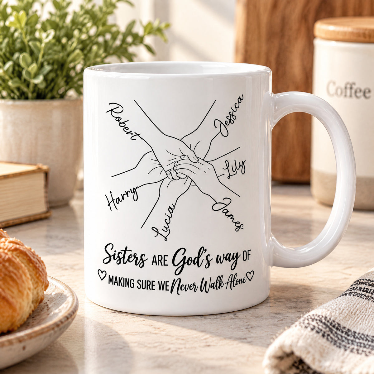 Personalized Sisters Name Mug on a kitchen counter next to a croissant plate and a striped towel