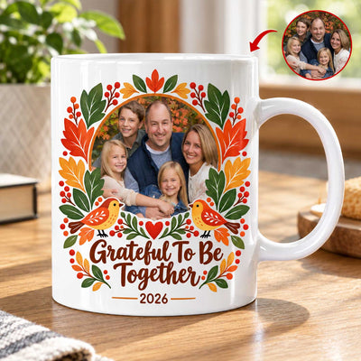 Thankful Together Personalized Photo Mug with a couple and child photo on a wooden table beside a plant