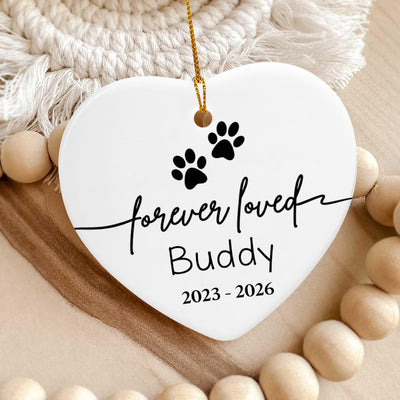 Forever Loved Personalized Ceramic Ornament with Buddy beside macrame fringe and wooden beads
