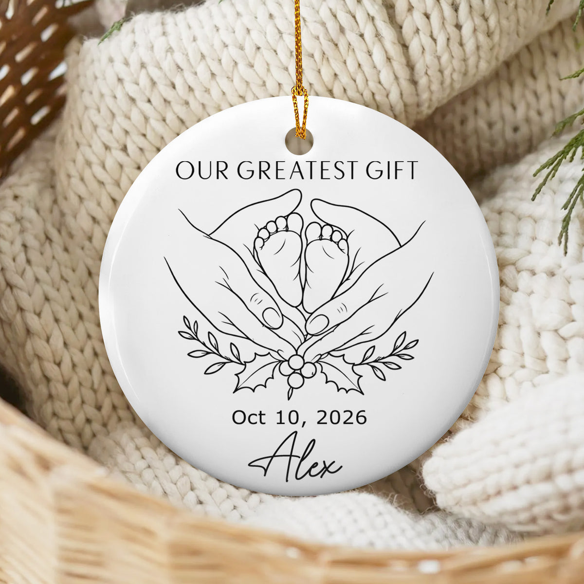 Personalized minimalist line art ornament resting on a cream knit blanket in a woven basket