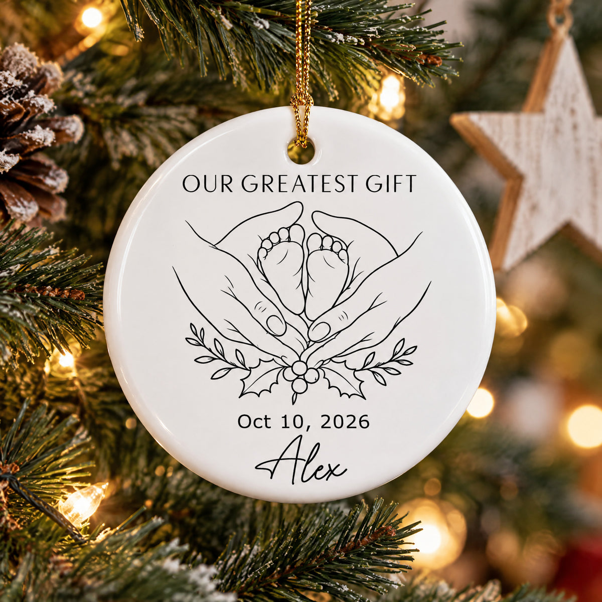 Personalized minimalist line art ornament on a frosted branch near a wooden star and glowing lights