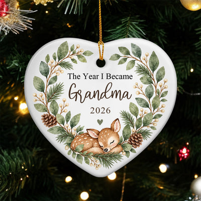 Personalized Ceramic Ornament Grandma Box heart hanging on a green Christmas tree with warm lights