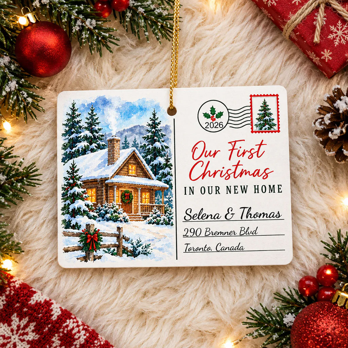 Personalized Rectangular Ceramic Christmas Ornament lying on white faux fur with red baubles, pine and a pinecone
