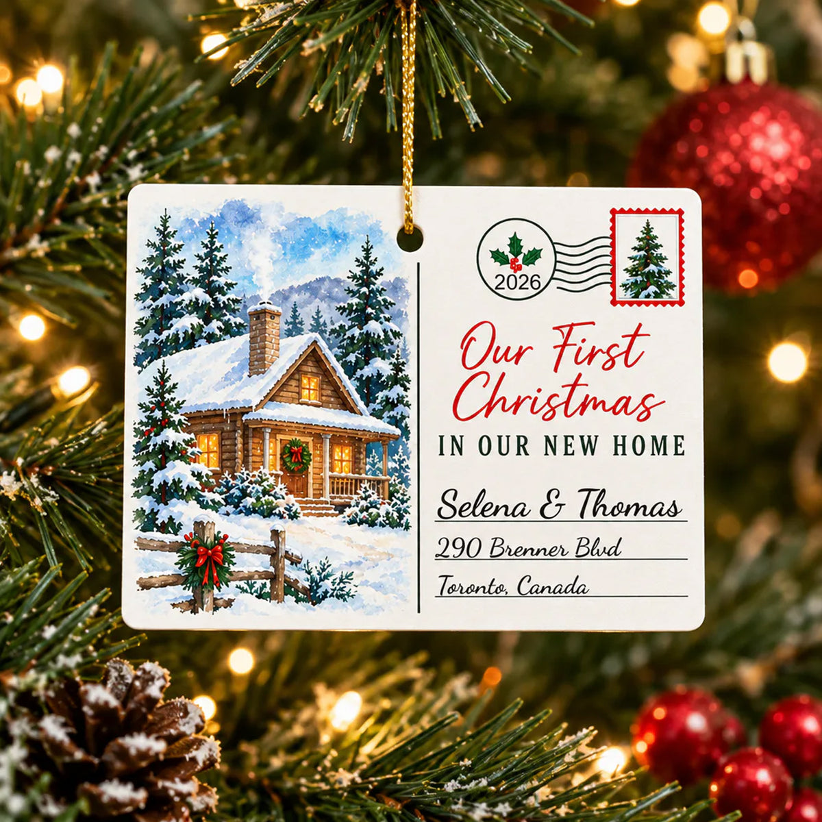 Personalized Rectangular Ceramic Christmas Ornament hanging from a pine branch with warm lights and a red bauble