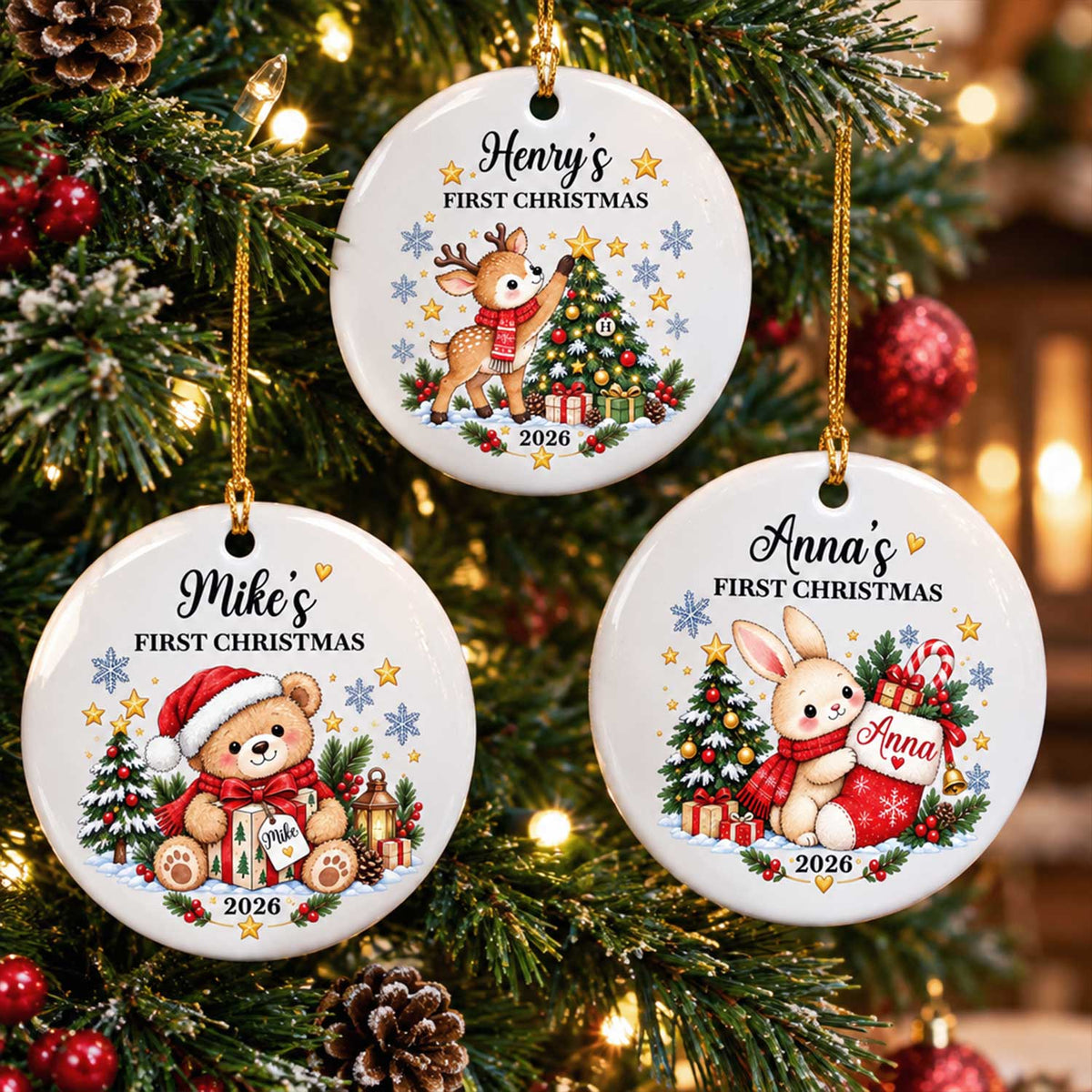 Personalized Ceramic Ornament First Christmas shown as three round designs: bear, deer and bunny on a lit tree