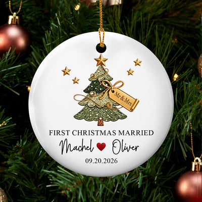 Personalized ceramic ornament First Christmas Married hanging on a green tree with red and copper baubles