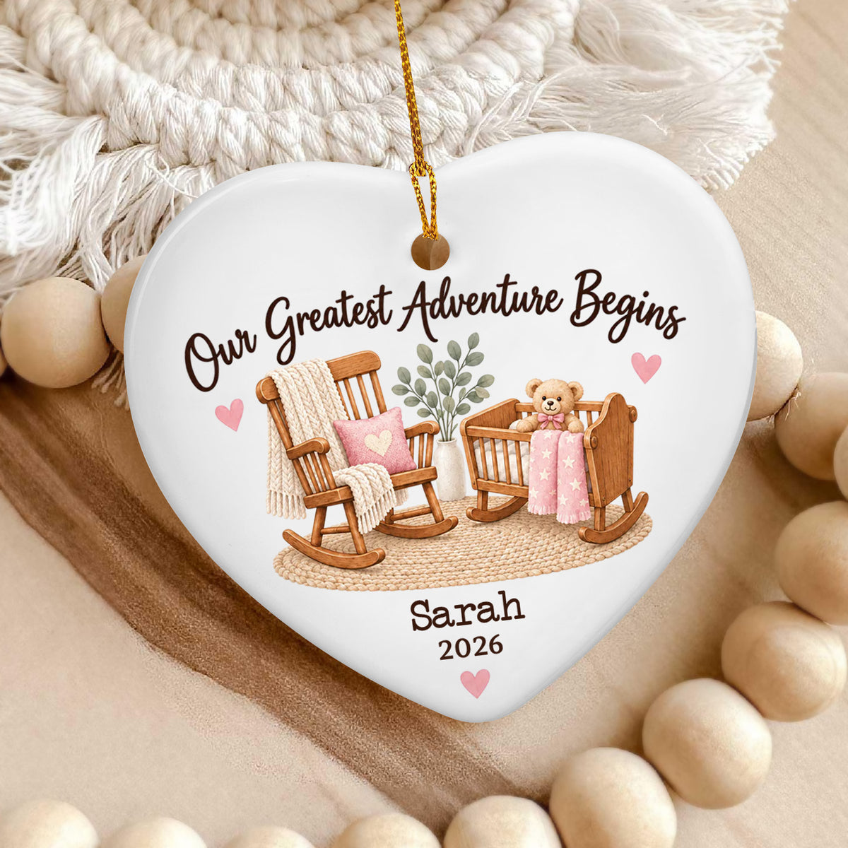 Personalized Ceramic Ornament Our Greatest Adventure Begins pink version beside macrame and wooden beads