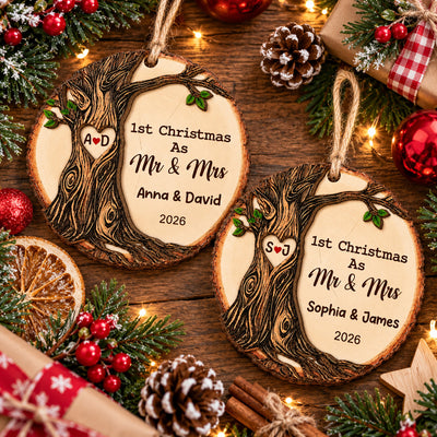 Personalized Wooden Ornament 1st Christmas Mr & Mrs held by a hand in front of tree lights, names Anna & David