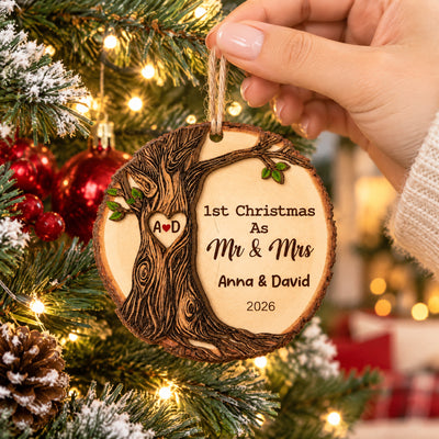 Personalized Wooden Ornament 1st Christmas Mr & Mrs held up beside red baubles, carved tree and heart initials A D