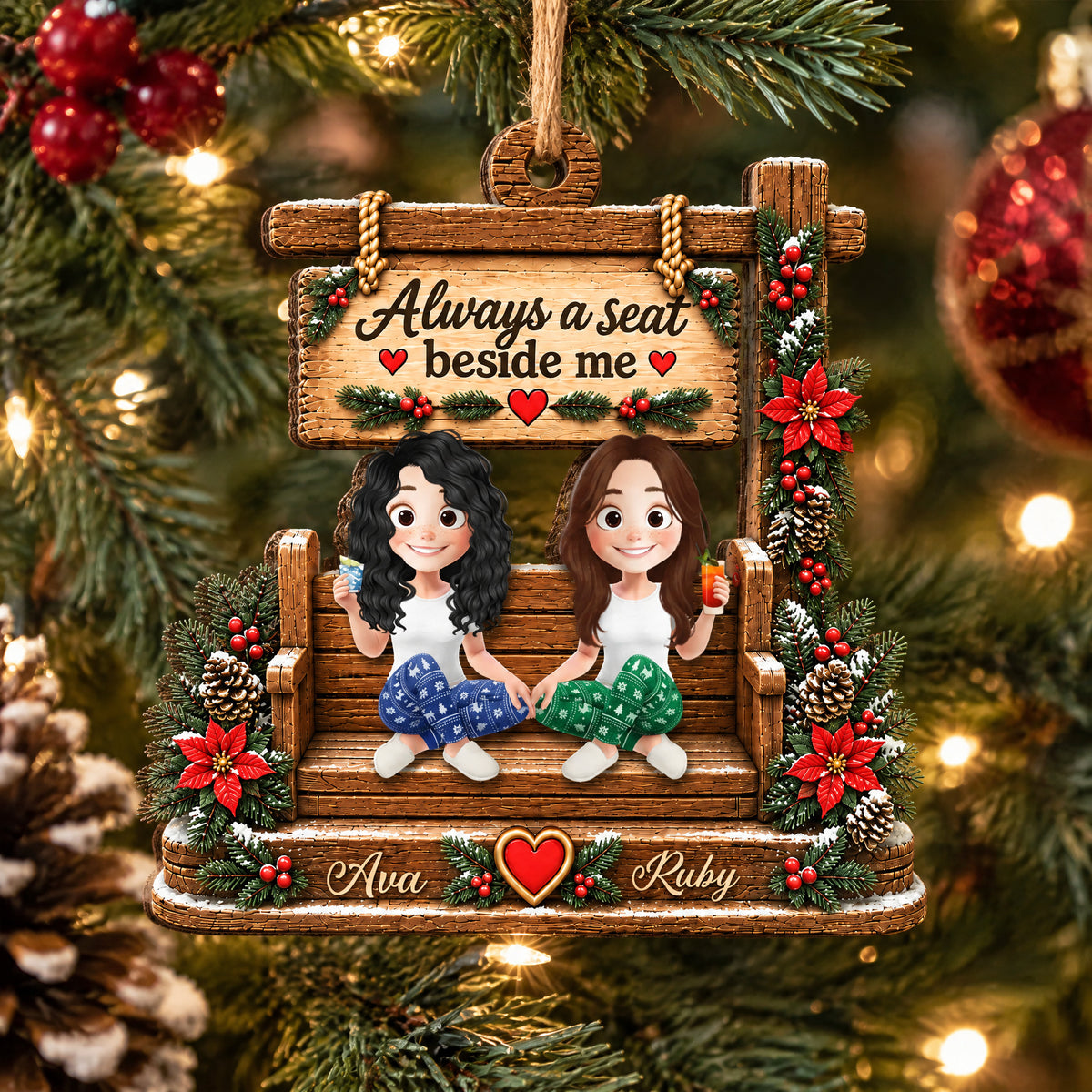 Personalized wooden ornament custom name with Ava and Ruby on a bench, framed by pine, red ornaments and a pinecone