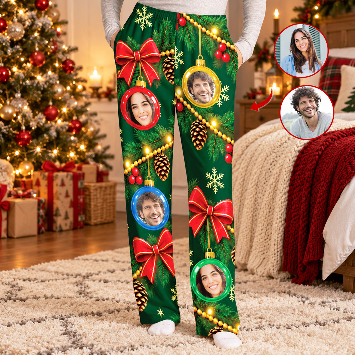Personalized pajamas pants custom face ornament in green, front view near a decorated tree and a red knit blanket
