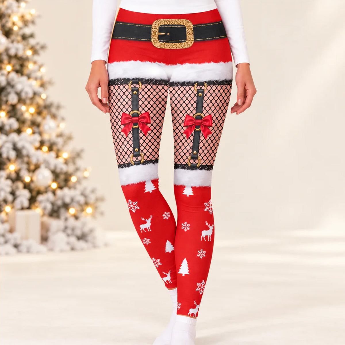 Personalized Christmas character leggings worn in front of a lit, snow-flocked Christmas tree