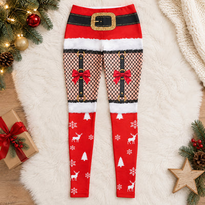 Personalized Christmas character leggings laid flat on white fur rug with gift, pine branches and wooden star